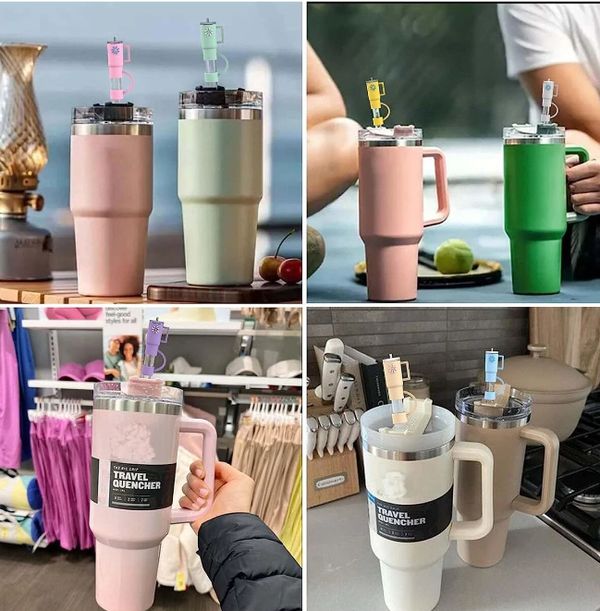 Straw toppers fitted to the straws of four large insulated tumblers